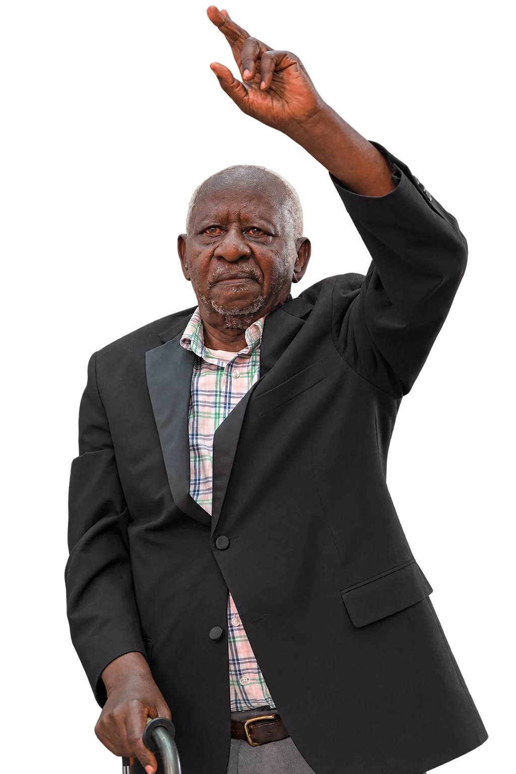 An older conference worshipper raising his hand, with a walking cane in his other hand